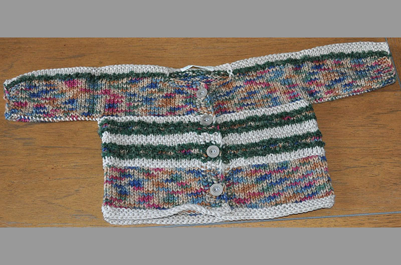 Light gray with wide multi color stripes