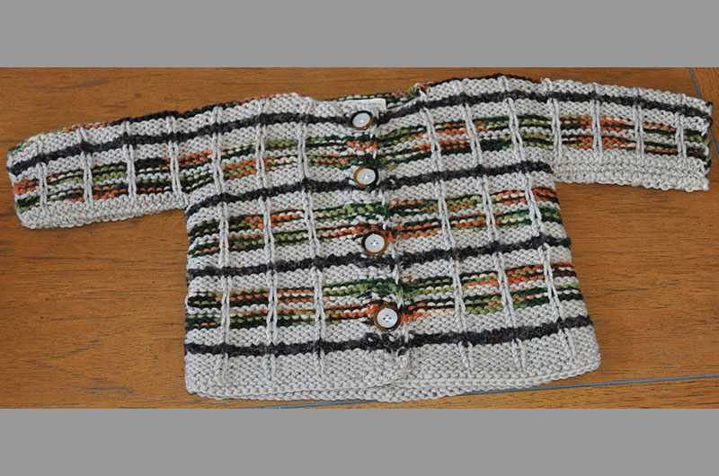 Off white with thin multi color stripes