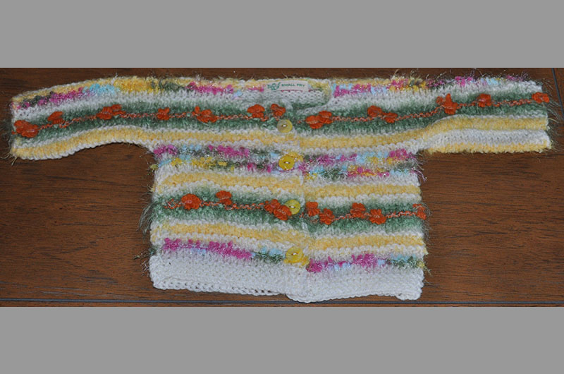 White with green and yellow stripes with flowers