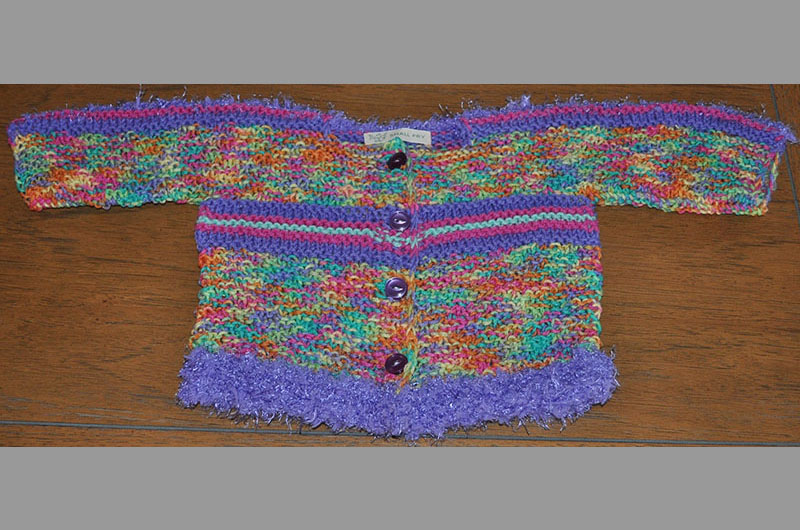 Blue with fringe and multi color stripes