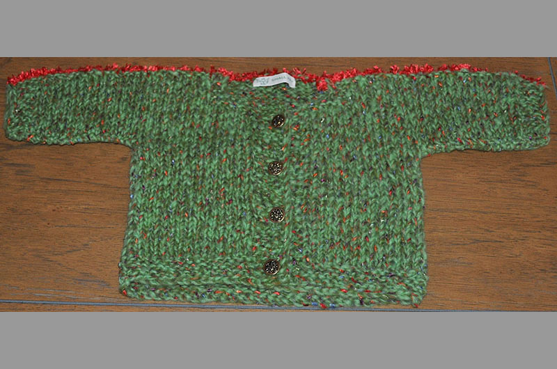 Green with red specks