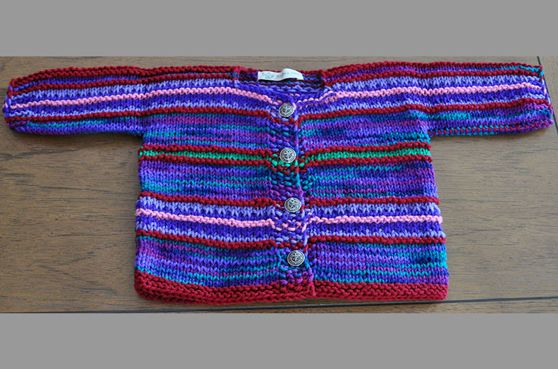 Dark blue with burgandy and pink